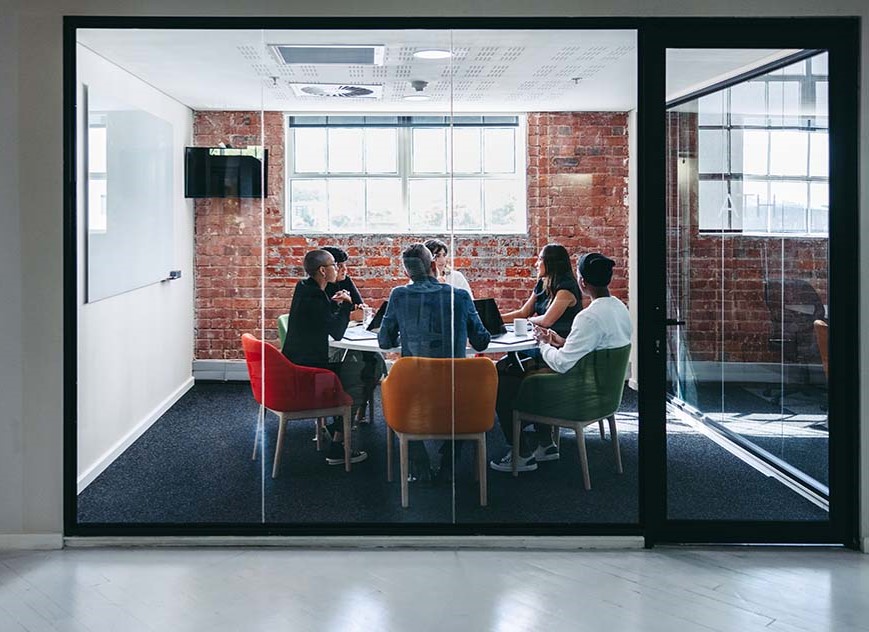 Executives sitting around a table in an office